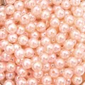Macro view of high-gloss pink ABS imitation pearls showing straight pre-drilled holes. - 8mm (Approx 150pcs) / Pale Green