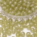 Transparente grüne 8mm Harzperlen mit Silberglitzer für DIY-Schmuckherstellung - Olivgrün