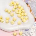 Perle a stella in acrilico giallo pastello 11x11mm per gioielli fatti a mano e fai da te - Giallo