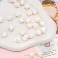 Perle a stella in acrilico bianco da 11mm per gioielli fai da te e catene cellulari - Beige