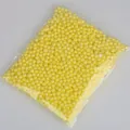 Small yellow foam filling beads for DIY crafts and gift box stuffing in a transparent bag - Approx. 900 Pieces / 5-10mm / Yellow