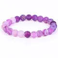 Macro view of purple dragon vein agate beads on a flexible bracelet. - 21cm / 6mm / Purple Weathered Stone