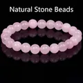 Close-up view of natural pink rose quartz gemstone beads bracelet for jewelry detail - 21cm / 10mm / Natural Rose Quartz