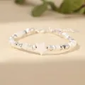 Macro view showing a white star pendant on a beaded shell and white jade bracelet - Star + White Jade / 17cm + Tail Chain / White (Single Star Style)