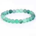 Detailed view of green weathered stone beads bracelet with unique crackle texture - 21cm / 6mm / Green Weathered Stone