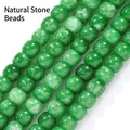 Macro view of 10x8mm green natural stone drum beads with delicate polished finish. - Old-Style Barrel Beads / 10x8mm (approx 45 Pieces/Pack) / Green Jade