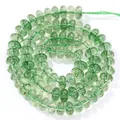 Detailed macro shot of green crystal abacus beads for DIY jewelry making. - 5x8mm Approx 77-82 Pieces / Green