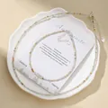 Macro detail of faceted natural stone beads on a minimalist necklace and anklet set - Necklace And Anklet Set / Amazonite