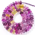 Detail view of 5x8mm translucent purple and yellow crystal abacus beads for jewelry making - 5x8mm Approx 77-82 Pieces / Colorful
