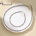 Elegant faceted natural stone bead necklace and anklet jewelry set on white plate - Necklace And Anklet Set / Anyolite Look