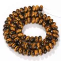 Detailed macro view of 5x8mm tiger eye glass abacus beads with a glossy polished finish - 5x8mm Abacus Beads (Approx 75-80 Pieces) / Yellow Tiger Eye