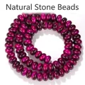 Nahaufnahme von 5x8mm magentafarbenen Tigerauge-Glasperlen für DIY-Schmuckherstellung. - 5x8mm Abakusperlen (ca. 75-80 Stück) / Fuchsia