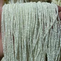 Varios hilos de pequeñas cuentas de concha blanca de 2-3 mm con brillo de nácar natural - Paquete de 3mm / Blanco