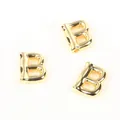 Detailed macro view of 20mm gold-plated copper balloon letter B beads for DIY jewelry - Letter B / 2 Pcs/Set
