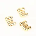 Macro view of polished 20mm gold copper letter E beads for DIY jewelry making crafts - Letter E / 2 Pcs/Set