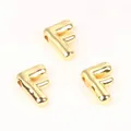 Close-up of shiny gold-plated copper letter F beads for DIY jewelry making - Letter F / 2 Pcs/Set