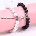 Close-up of magnetic clasp connecting black and white marble stone beaded bracelets - Round Magnetic Style / 19cm (8mm Beads) / Matte Black White Turquoise