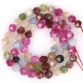 Primo piano di perline di tormalina naturale sfaccettate per gioielli fai-da-te - Stile Multi-taglio / 6mm / Multicolore
