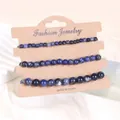Detailansicht von 3er-Set Naturstein-Armbändern auf Kraftpapier-Displaykarte - Alte blaue Ader