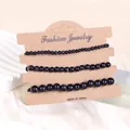 Detailansicht des dreiteiligen Blaustandstein-Perlenarmband-Sets auf Karte - Blauer Goldfluss