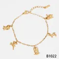 Elegant gold stainless steel bracelet featuring owl and unicorn animal charm pendants - Owl Pendant Bracelet (B1022) / Gold