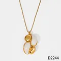 Elegant gold stainless steel necklace featuring organic white resin pendant variant - Necklace (D2244) / Gold with White