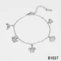 Elegant silver stainless steel ocean charm bracelet with sea turtle and seashell pendants - Turtle Shell Pendant Bracelet (B1027) / Silver
