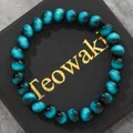 Blue cat-eye glass beaded bracelet featuring round imitation tiger eye beads for unisex - 19cm 8mm / Sapphire Blue
