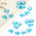 Close-up detail of 9x11mm faceted triangle blue crystal beads for jewelry making - 9x11mm 20 Pieces / Lake Blue