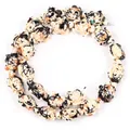 Detail view of synthetic turquoise turtle-shaped loose beads for DIY jewelry crafting. - 14x17mm Sea Turtle Color No. 1 / 22-23 Pieces/String / Black White Orange