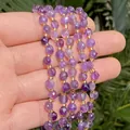 Primer plano de cuentas de cristal de amatista púrpura facetadas para joyería DIY - 6mm / Amatista