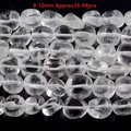 Macro-opname van natuurlijke helder witte kristal kwarts kralen voor DIY sieraden projecten - Freeform White Quartz / 8-10mm Irregular Chips