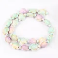 Detailed view of colorful turtle-shaped synthetic turquoise beads for DIY jewelry - 14x17mm Sea Turtle Color No. 36 / 22-23 Pieces/String / Light Green Light Purple