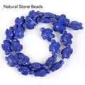 Detailed view of blue synthetic turquoise turtle-shaped beads for DIY jewelry - 14x17mm Shiny Sea Turtle / 22-23 Pieces/String / Shiny Royal Blue