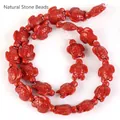 Detail view of red synthetic turquoise turtle-shaped beads for DIY jewelry making - 14x17mm Shiny Sea Turtle / 22-23 Pieces/String / Shiny Deep Orange