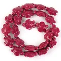Detailed view of synthetic turquoise beads carved in red turtle shapes for DIY projects - 14x17mm Shiny Sea Turtle / 22-23 Pieces/String / Shiny Goose Crown Purple
