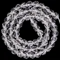 Detailopname van gefacetteerde witte kristallen kralen voor DIY sieraden 6mm 61 stuks per streng - Multi-Gefacetteerde Ronde Kralen / 6mm (Ongeveer 61st/streng) / Helder Wit