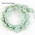 Detail shot of light blue synthetic turquoise turtle beads for DIY jewelry making - 14x17mm Shiny Sea Turtle / 22-23 Pieces/String / Shiny Light Green