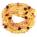 Nahaufnahme von natürlichen unregelmäßigen Bernsteinperlen für DIY-Schmuck und Bastelarbeiten - 5-6mm (ca. 80 Stück/Packung) / Glatt Hell Gemischt