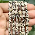 Close-up of 6x8mm faceted flat oval Dalmatian stone loose beads for DIY jewelry - Faceted Flat Oval / 23 Pieces/Pack (6x8mm) / Dalmatian Jasper