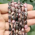 Detail view of 6x8mm faceted flat oval natural pink rhodonite stone beads for DIY jewelry - Faceted Flat Oval / 23 Pieces/Pack (6x8mm) / Rhodonite
