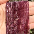 Detailed macro view of faceted dark purple natural stone beads for DIY jewelry making - 2mm Approx 170 Pieces / Purple Garnet