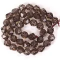 Vista detallada de cuentas de cuarzo ahumado facetado, 10mm, aprox. 36 piezas para joyería DIY. - Faceted Irregular Smoky Quartz / 10mm (Aprox. 36 piezas) / Marrón Té