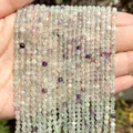 Close-up of 2-4mm faceted natural stone beads in green and purple colors for DIY jewelry - 3mm Approx 120 Pieces / Green Fluorite