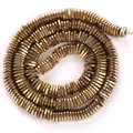 Detailed view of gold-plated hematite square spacer beads for DIY jewelry making - Triangle Spacer / 6mm / Electroplated Gold