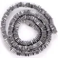 Close-up of electroplated hematite triangle spacer beads for DIY jewelry - Triangle Spacer / 6mm / White Gold