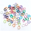 Close-up macro view of multi-colored 8mm candy color open jump rings for DIY jewelry - 1.2*8mm / Multicolor