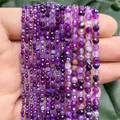 Close-up detail of purple faceted dragon vein agate beads for DIY jewelry making - 190 Pieces/Pack / Purple Dragon Vein