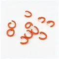 Macro view of 1.2x8mm bright orange baked lacquer jump rings for DIY handicraft - 1.2*8mm / Orange
