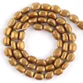 Perle di ematite ovali dorate per la creazione di gioielli fai da te - 5-8 mm / Oro opaco